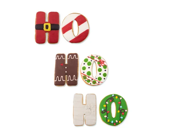 Deliciosos biscoitos de Natal diferentes no fundo branco. Poste — Fotografia de Stock