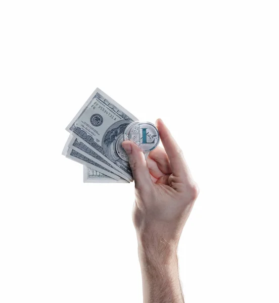 Mão com moedas de litecoins e notas de dólar no fundo branco. Conceito de criptomoeda de troca de moeda digital — Fotografia de Stock
