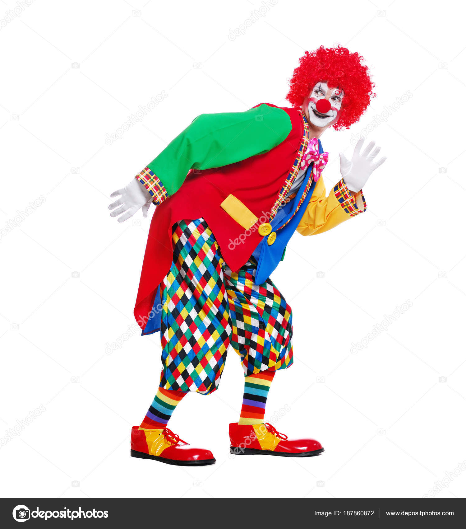 Funny Clown Imitating Comic Walk In A White Studio Stock Photo C Iagodina