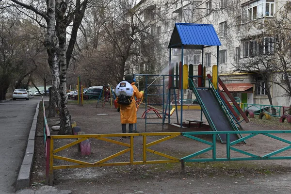 Almaty Kazakhstan 2020 Man Special Suit Disinfects Yard Playground — Stock Photo, Image