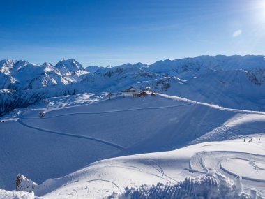 Skiing with amazing view of french famous mountains in beautiful winter snow 3 vallees France, Meribel. 2018. Blue sky and a lot of snow. clipart