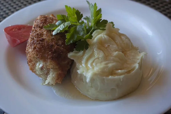 Chicken Kiev with parsley and potato puree — Stock Photo, Image