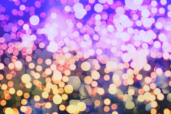 Resumo Fundo festivo. Glitter vintage luzes de fundo com luzes desfocadas. Natal e Ano Novo festa bokeh fundo com copyspace. — Fotografia de Stock