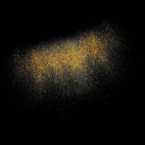 Golden glitter on a black background — Stock Photo, Image