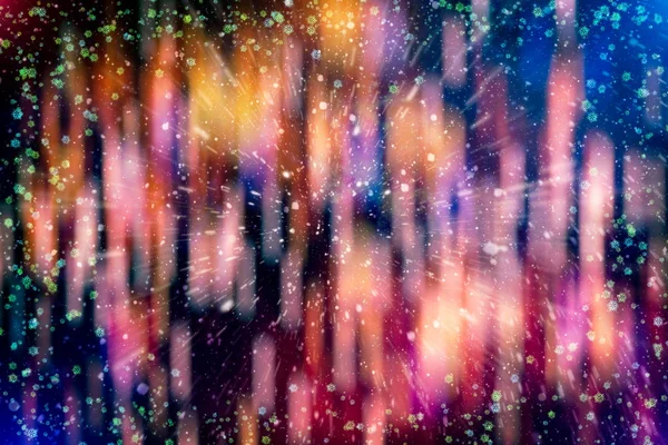 Blurred bokeh christmas background with snowflakes . Light abstract Christmas background with snowflakes and stars — Stock Photo, Image
