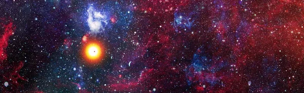 Panoramic looking into deep space. Dark night sky full of stars. The nebula in outer space. Elements of this image furnished by NASA.