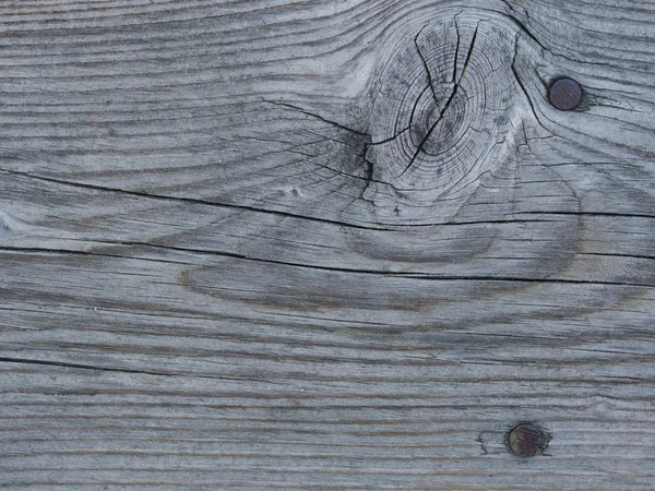 Деревянный бэкграунд с гвоздями — стоковое фото