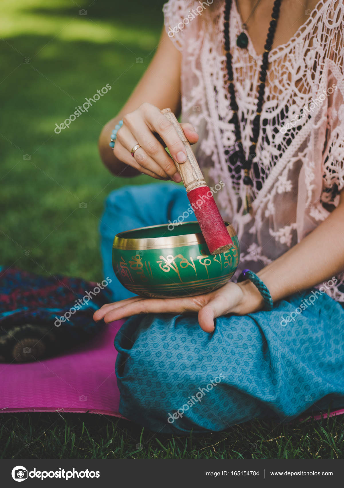 Hands Of A Woman Playing Tibetan Singing Bowl In Nature Vintage