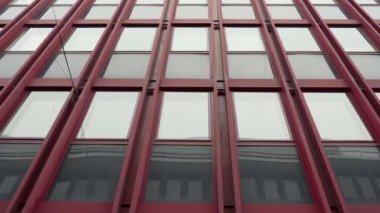 Steadicam shot: modern buildings in old european city. Facades of houses in narrow streets at Scandinavia. Traveling concept. Slow motion.