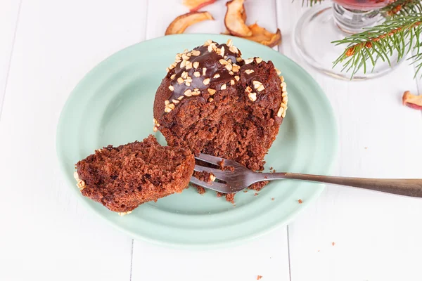 Čokoládový muffin na dřevěný stůl — Stock fotografie