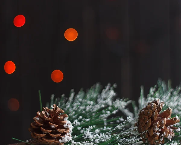 Fir branch with pine cones, Christmas toys — Stock Photo, Image