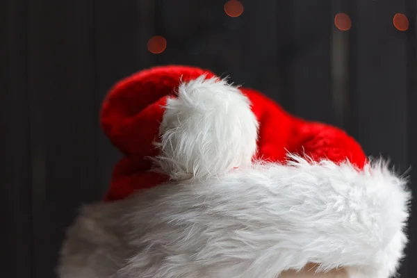 Santa Claus hat with bauble — Stock Photo, Image