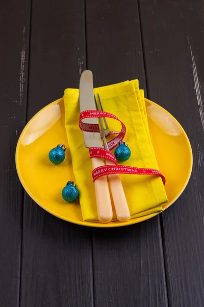 Christmas serving cutlery on plate — Stock Photo, Image