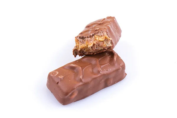Barra de chocolate con caramelo sobre blanco —  Fotos de Stock