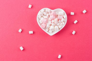 heart-shaped plate with marshmallows clipart