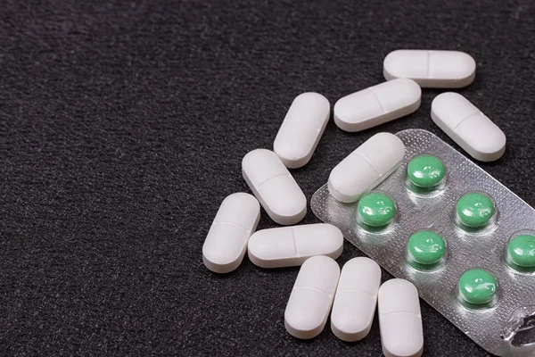 Białe tabletki z bliska — Zdjęcie stockowe