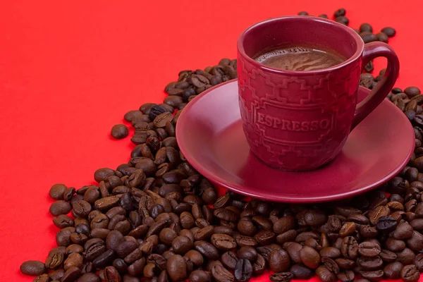 Taza de café con granos de café —  Fotos de Stock