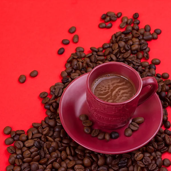Taza de café con granos de café — Foto de Stock