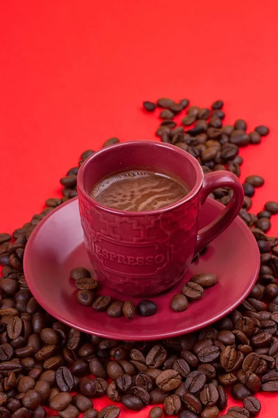 Taza de café con granos de café —  Fotos de Stock