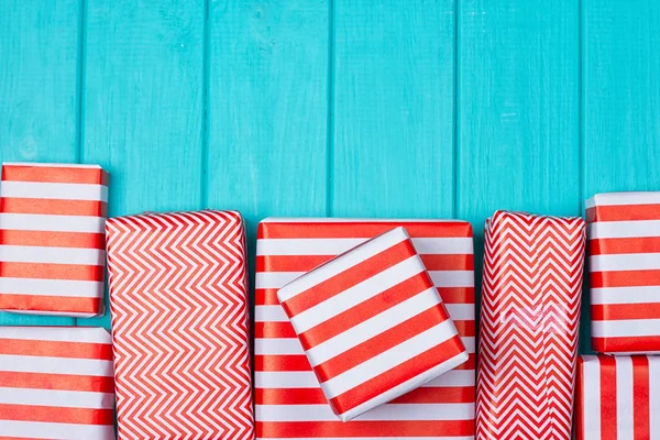 Many gifts in a red and white wrapper — Stock Photo, Image