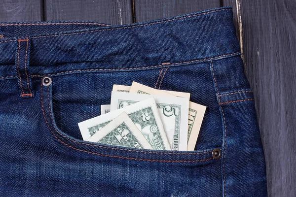 Dollars in a pocket of jeans — Stock Photo, Image
