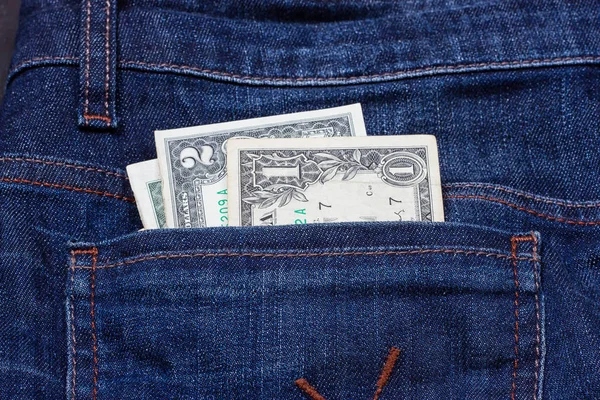 Dollars in a pocket of jeans — Stock Photo, Image