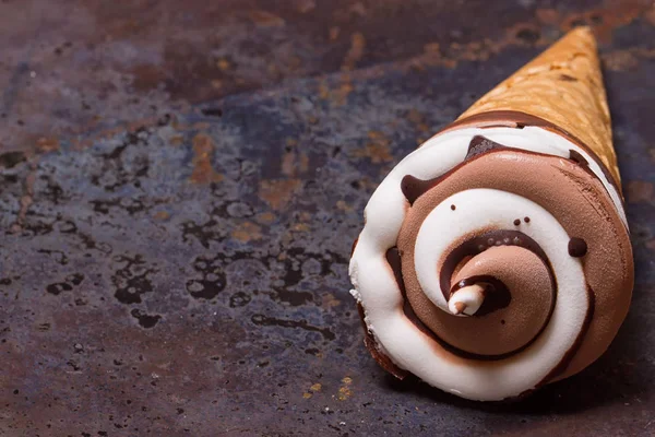 Vanilla ice cream cone with chocolate — Stock Photo, Image