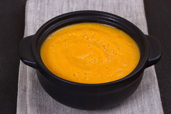 Pumpkin and carrot soup with cream and parsley — Stock Photo, Image