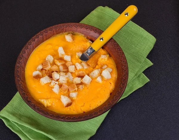 Pumpkin and carrot soup with cream and parsley — Stock Photo, Image