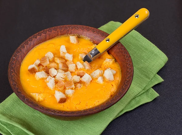 Pumpkin and carrot soup with cream and parsley — Stock Photo, Image