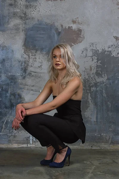 Portrait of a girl with long hair in youth clothes — Stock Photo, Image