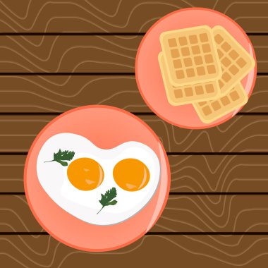 Kahvaltı için çırpılmış yumurta ve tahtadan bir masada Belçika waffle 'ı.