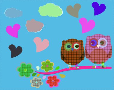 İki baykuş ve tr ağaç dalına oturan