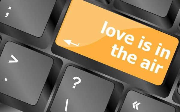 Moderne Tastatur mit Liebe liegt in der Luft Text — Stockfoto