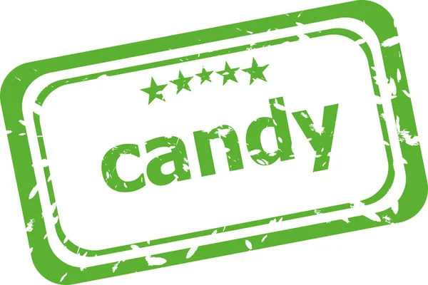 Candy on rubber stamp over a white background — Stock Photo, Image