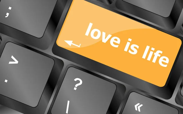 Modern keyboard with love is life text symbols — Stock Photo, Image