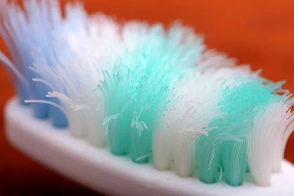 Xtreme Macro close up of toothbrush with wooden background — Stock Photo, Image