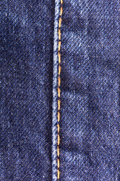 Jeans vaqueros fondo con costura de diseño de moda jeans. Viejo vaquero vintage grunge —  Fotos de Stock