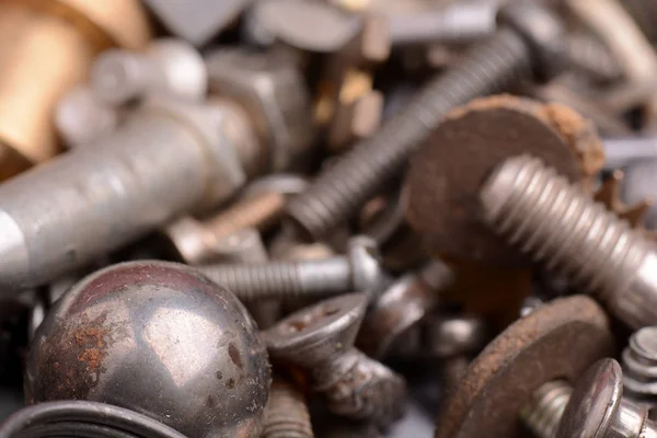 Old rusty screw,nuts and bolt with vintage style, close up — Stock Photo, Image