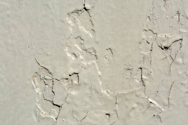 Soyut yıpranmış doku lekeli eski alçı açık gri ve yaşlı boya beyaz tuğla duvar arka plan kırsal Oda, grungy paslı bloklar