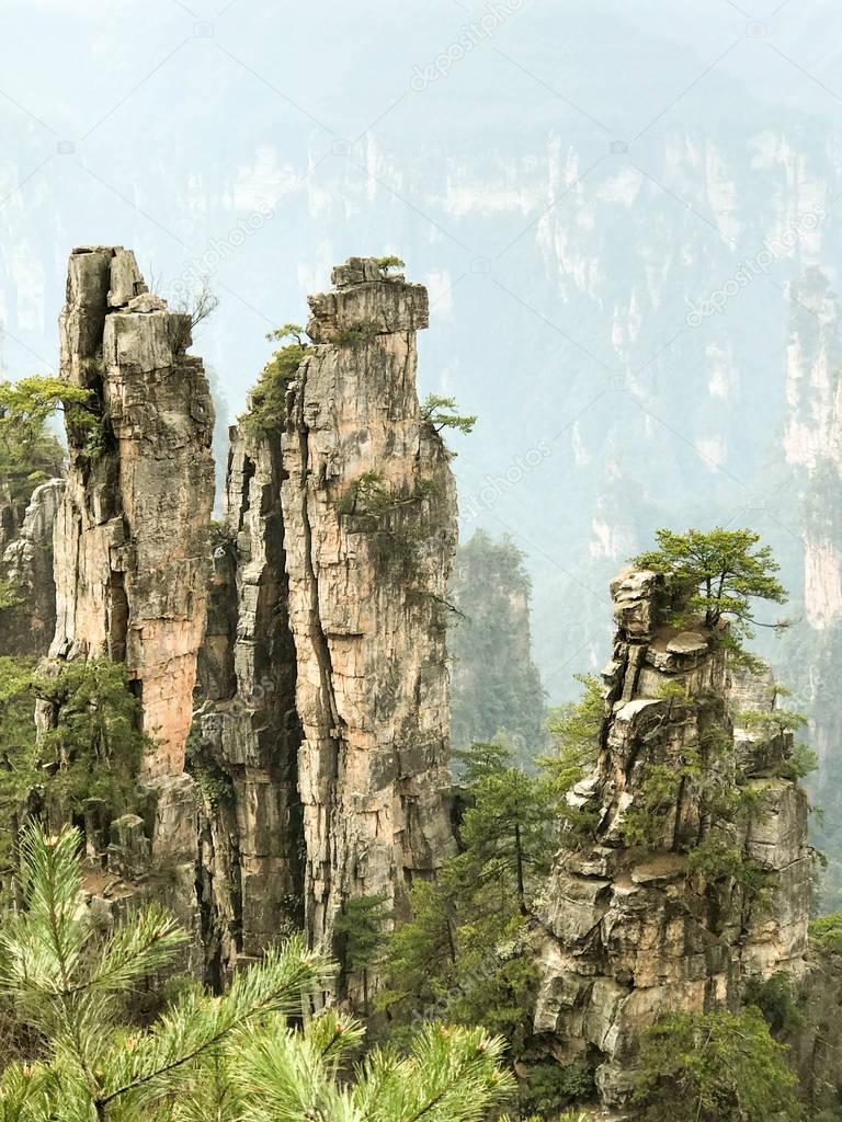 Amazing view of natural quartz sandstone pillars of the Tianzi Mountains (Avatar Mountains) in the Zhangjiajie National Forest Park, Hunan Province, China.