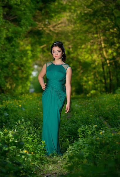 Girl in a green dress — Stock Photo, Image