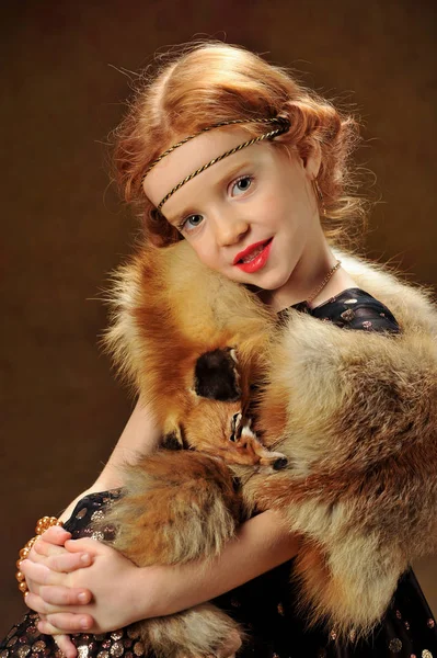 A young girl in an original outfit — Stock Photo, Image