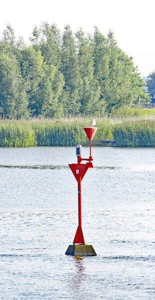 River traffic signs on a river in Holland; ; 14:30 p.m .; August 27, 2017; Countries, Netherlands, Europe