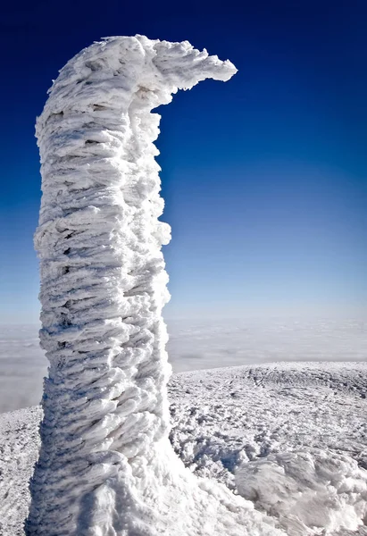 Ice monument on mountain top — Stock Photo, Image