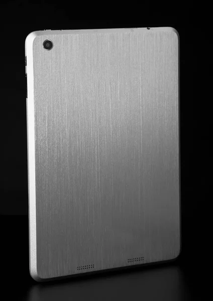 Tablet metal prata branco no fundo sombra preta slim volta l — Fotografia de Stock