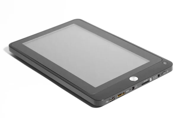 Tablet nero con schermo grigio sdraiato con ombra frontale — Foto Stock