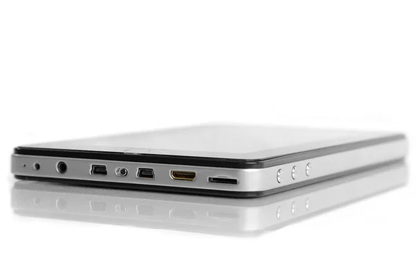 Tablet dispositivo preto com prata metal lado fechar o porto — Fotografia de Stock