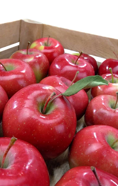 Apple in a box — Stock Photo, Image