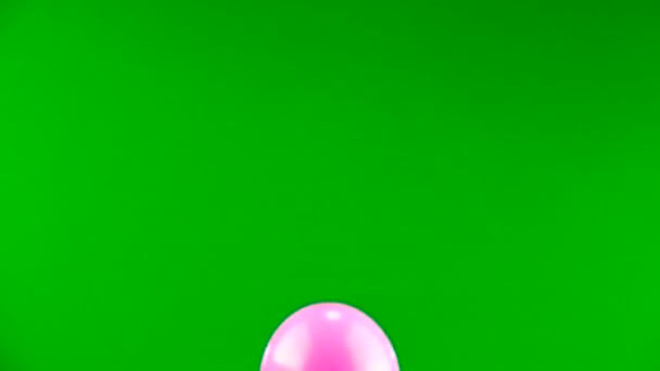 Pink Ball Flies Green Screen — Stock Video
